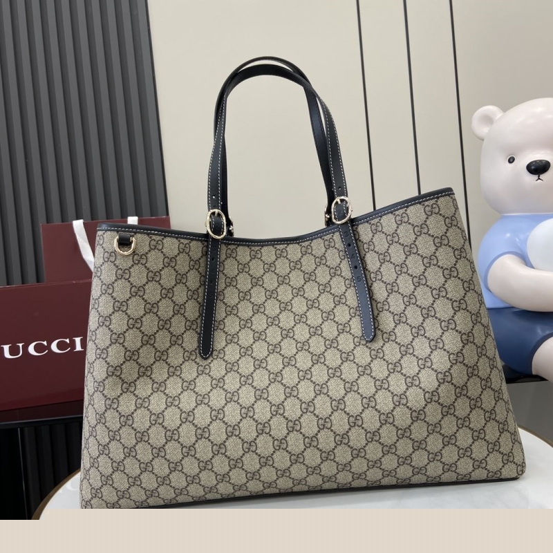 G*u*i shopping bags